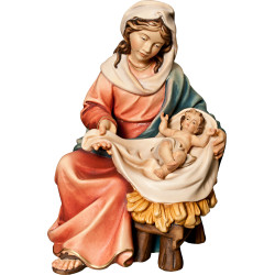 María sentada con Niño Jesús
